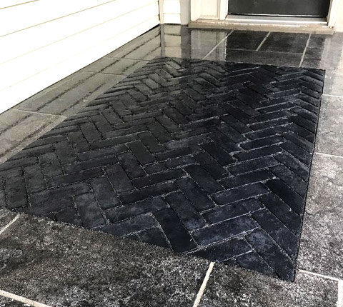 grey interlock by front door