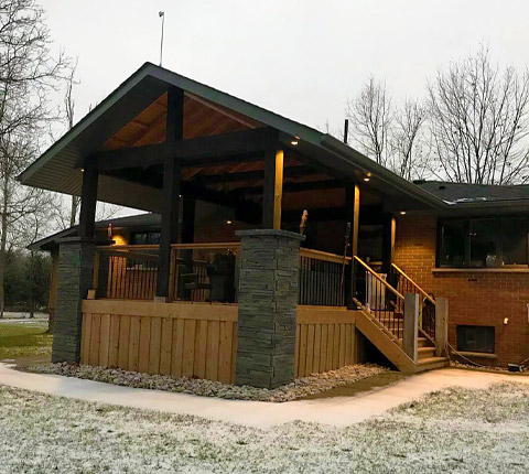 wooden hut with natural stone